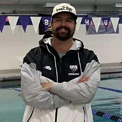 Evan Sholudko in front of the UB pool